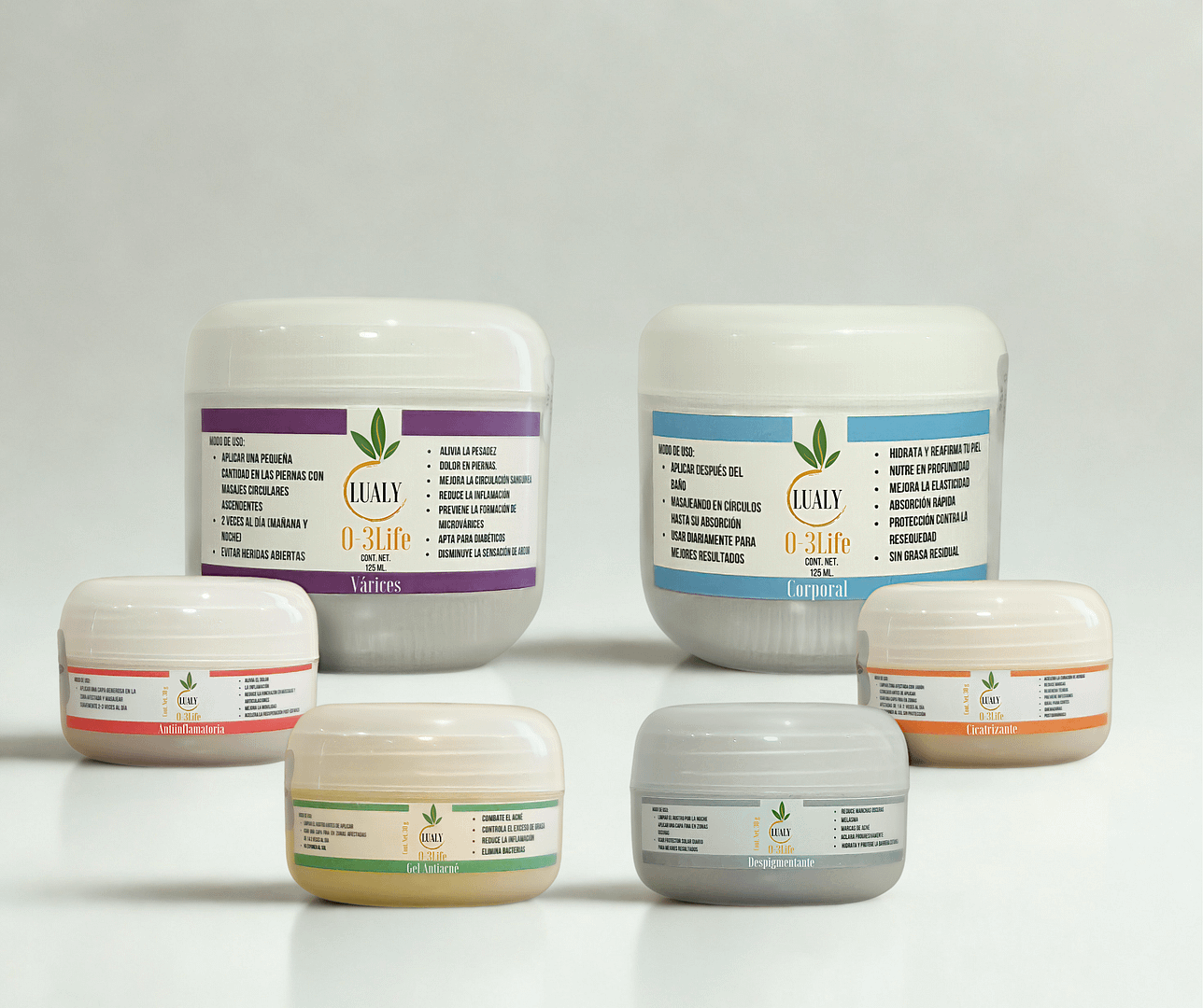 Colección completa de la línea dermatológica con ozono Lualy O-3Life, mostrando las cremas para várices, corporal, antiinflamatoria, gel antiacné, despigmentante y cicatrizante, destacando la variedad de productos para el cuidado de la piel.